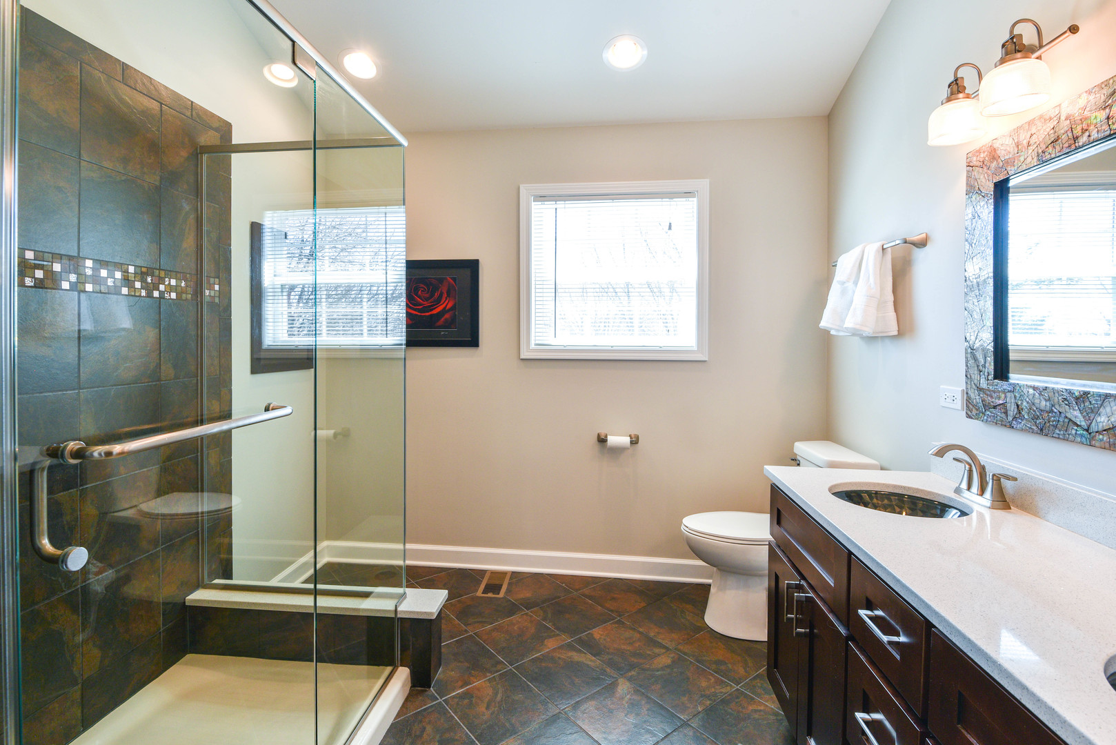 44 Forestview Lane Aurora, IL 60502 - Photo 14 of 18 a bathroom with a sink and a mirror
