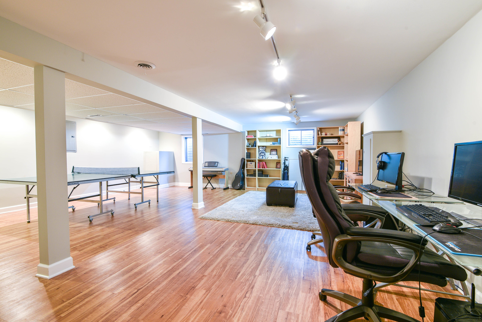 44 Forestview Lane Aurora, IL 60502 - Photo 15 of 18 a view of a workspace with furniture and wooden floor
