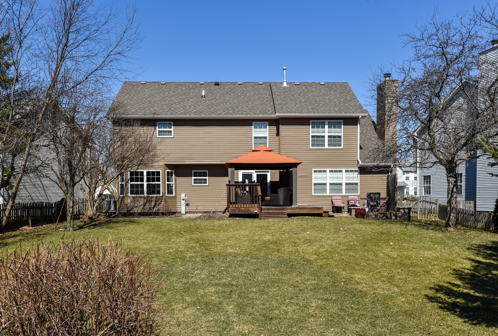 44 Forestview Lane Aurora, IL 60502 - Photo 17 of 18 a view of a house with a yard and large trees
