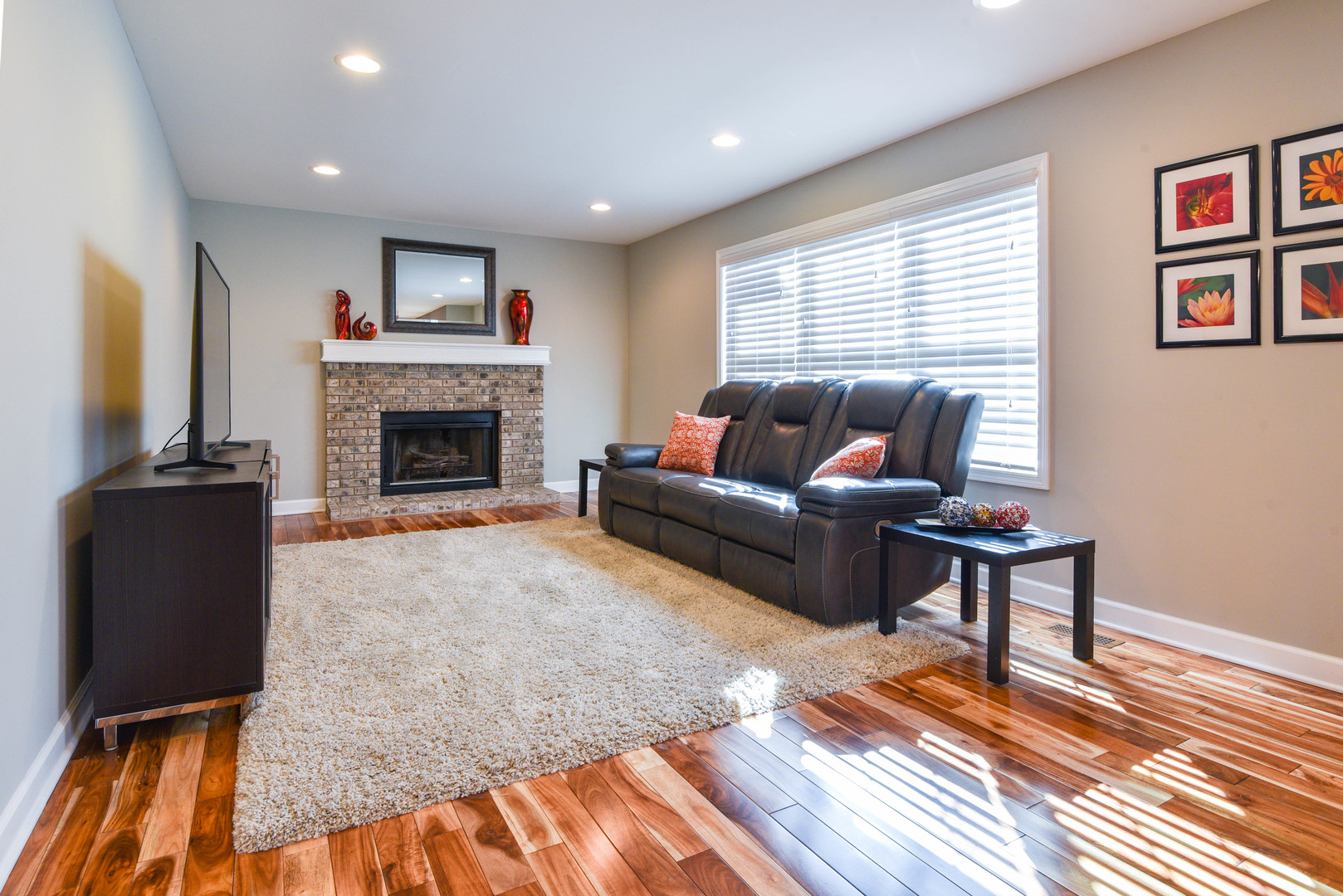 44 Forestview Lane Aurora, IL 60502 - Photo 7 of 18 a living room with furniture and a fireplace