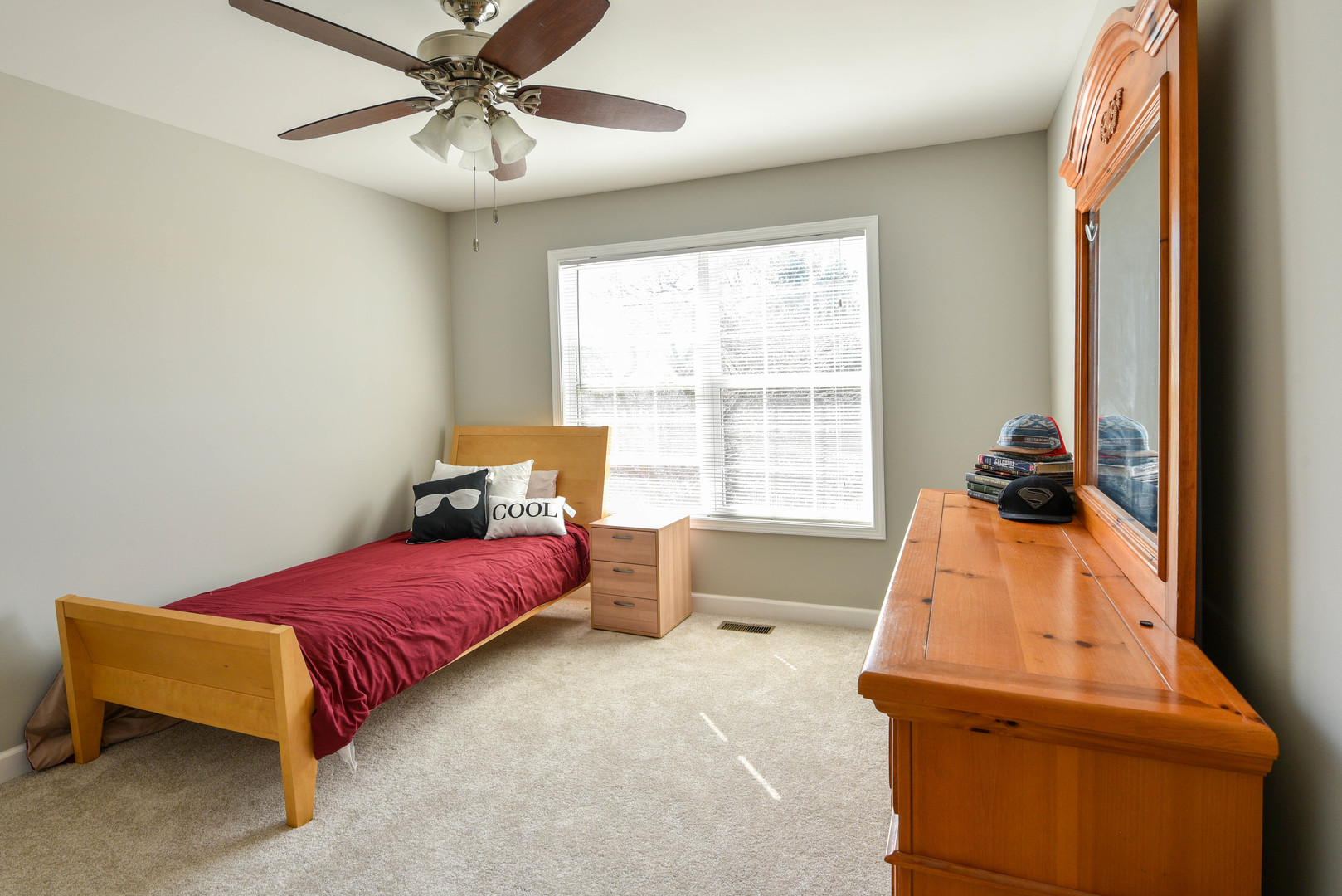 44 Forestview Lane Aurora, IL 60502 - Photo 9 of 18 a bedroom with a bed and a window