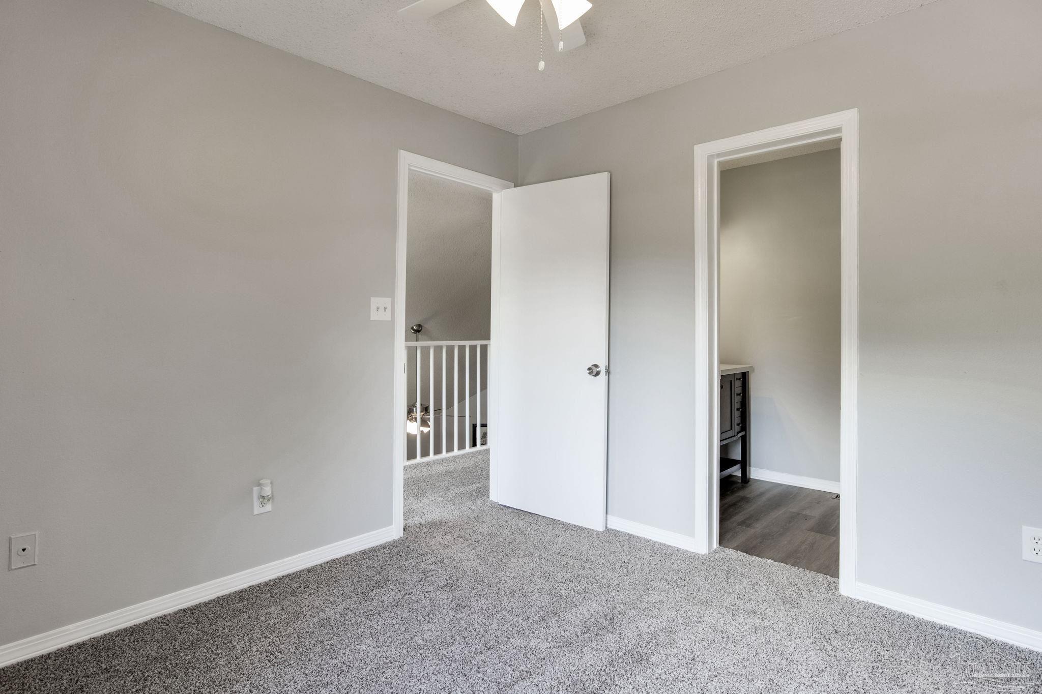4921 Jennifer Lane Pace, FL 32571 - Photo 30 of 36 a view of an empty room with a fireplace