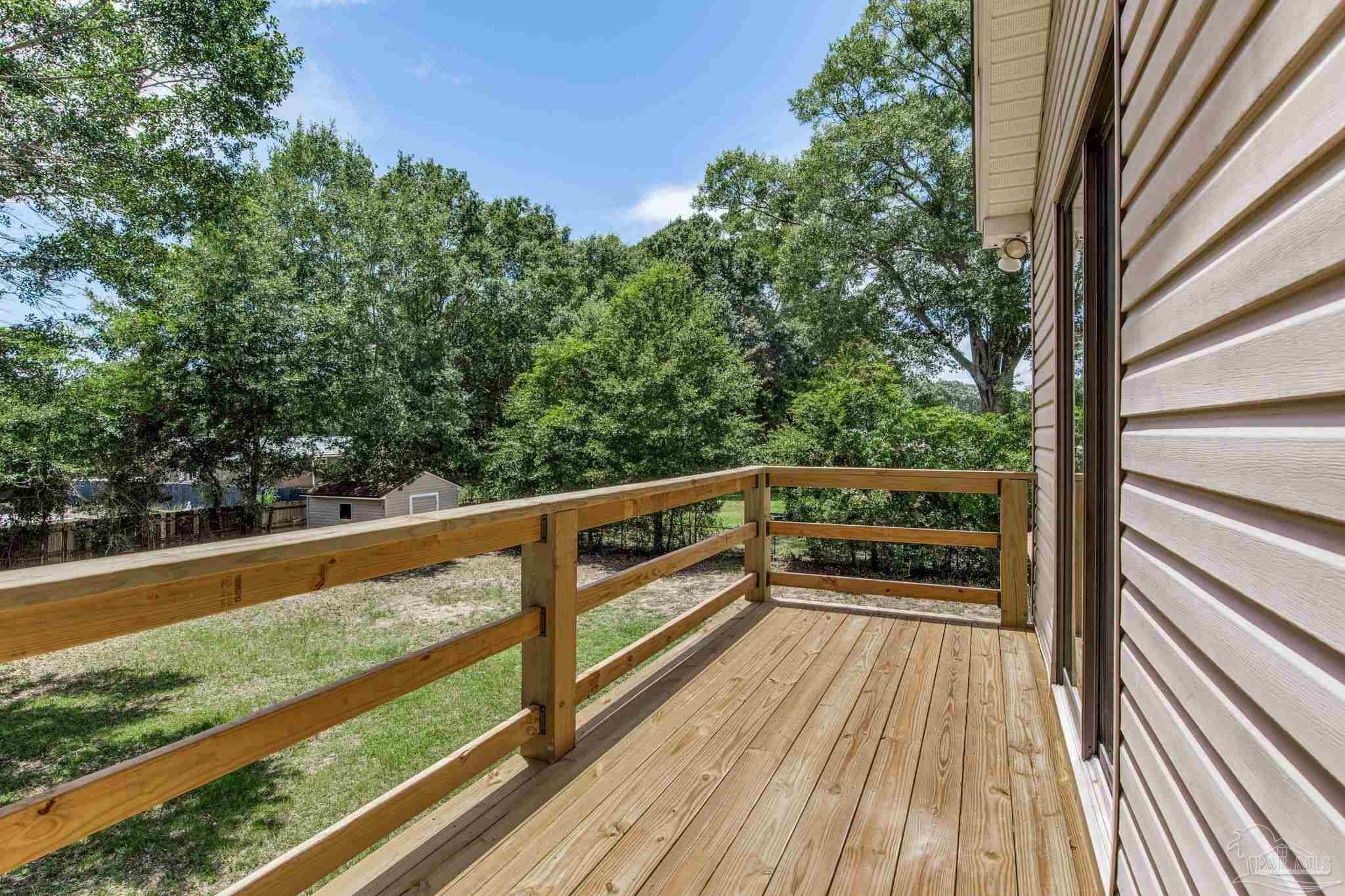 4921 Jennifer Lane Pace, FL 32571 - Photo 33 of 36 a view of balcony and deck