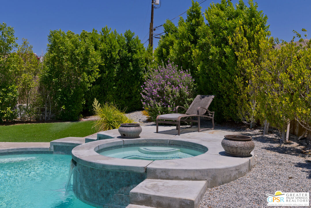 12800 Miracle Hill Road Desert Hot Springs, CA 92240 - Photo 2 of 51 a view of a backyard with sitting area