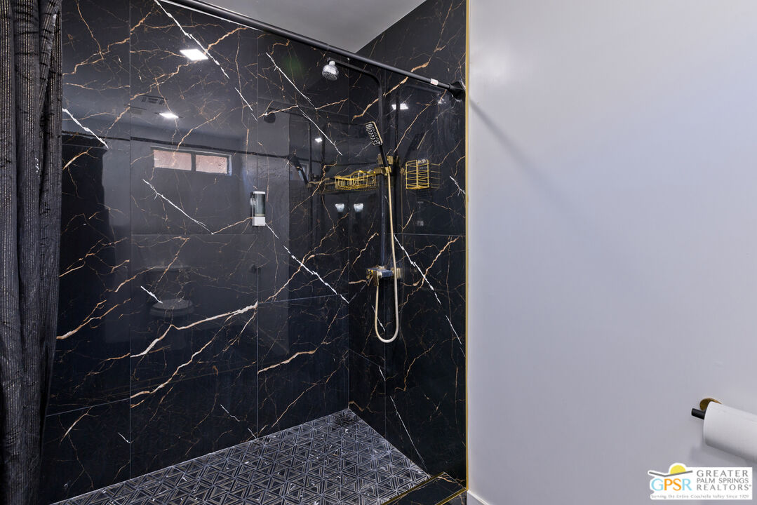 12800 Miracle Hill Road Desert Hot Springs, CA 92240 - Photo 29 of 51 a bathroom with a shower