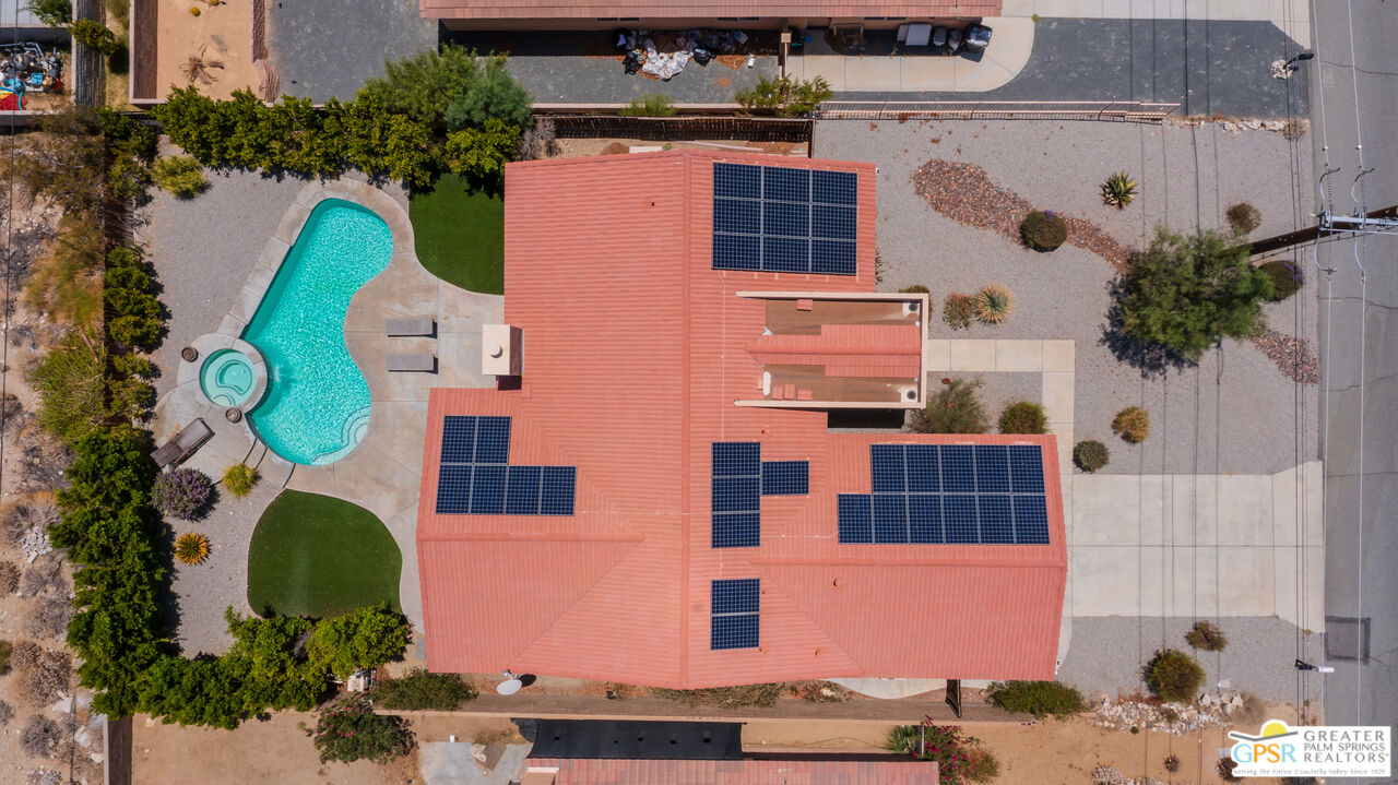 12800 Miracle Hill Road Desert Hot Springs, CA 92240 - Photo 6 of 51 an aerial view of residential house with outdoor space and parking