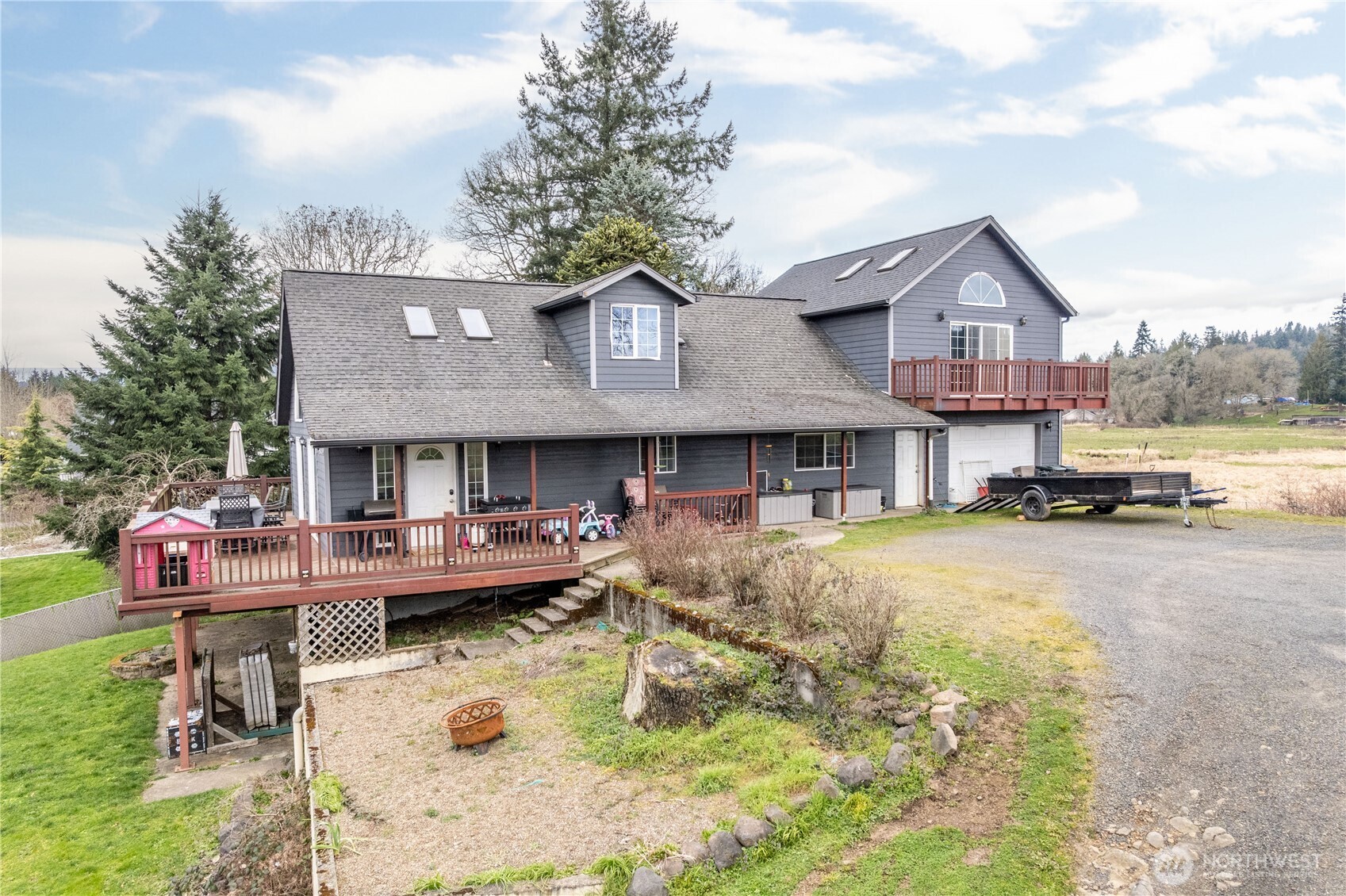4514 Ohio Street Longview, WA 98632 - Photo 22 of 30 a swimming pool view with a seating space and a garden