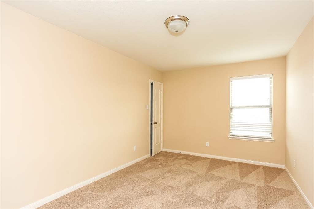 1421 Park Trails Boulevard Princeton, TX 75407 - Photo 11 of 17 a view of an empty room with a window