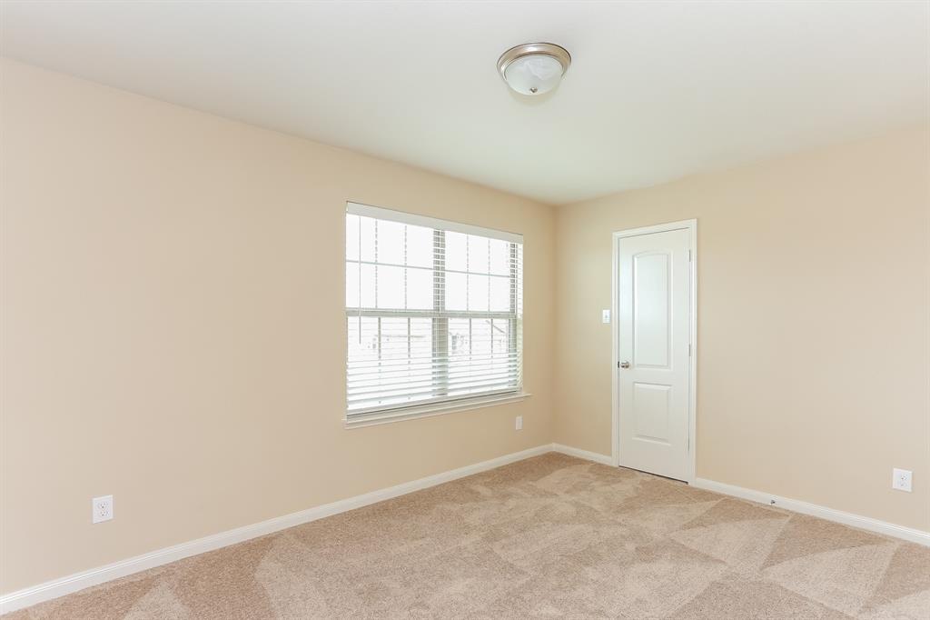 1421 Park Trails Boulevard Princeton, TX 75407 - Photo 12 of 17 an empty room with windows