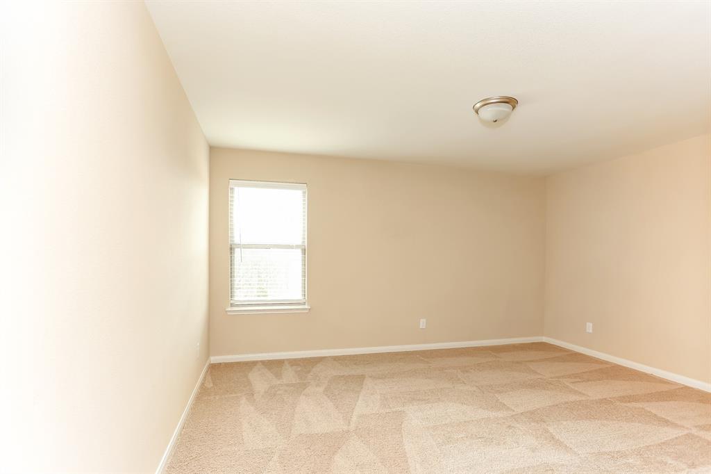 1421 Park Trails Boulevard Princeton, TX 75407 - Photo 14 of 17 a view of a room that has a window in it