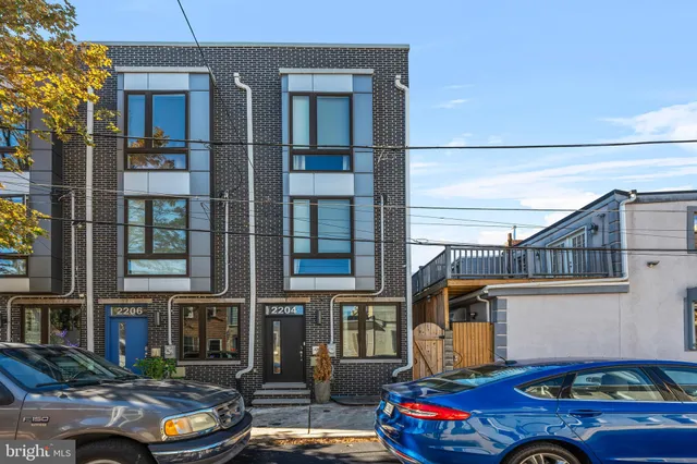 a car parked in front of a house
