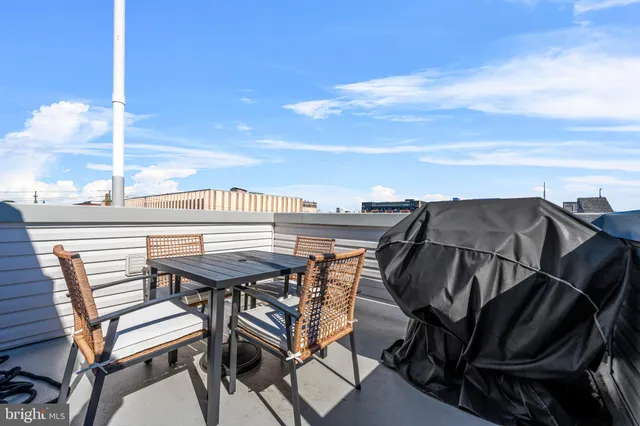 a view of a terrace with chairs