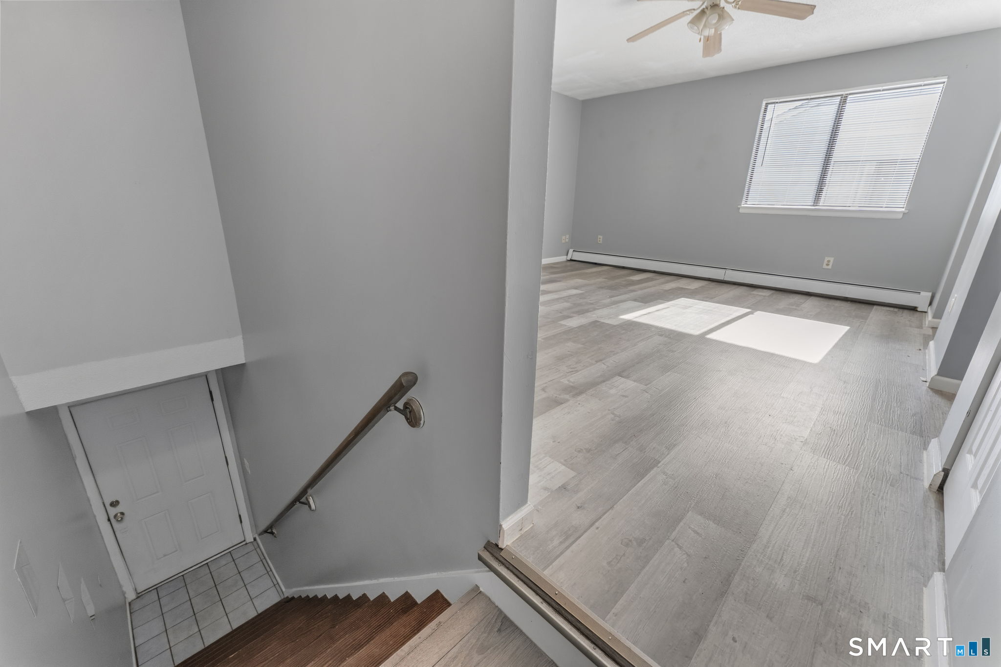 5-7 Warner St Extension, Unit 5B Hartford, CT 06114 - Photo 2 of 17 an entryway view with staircase