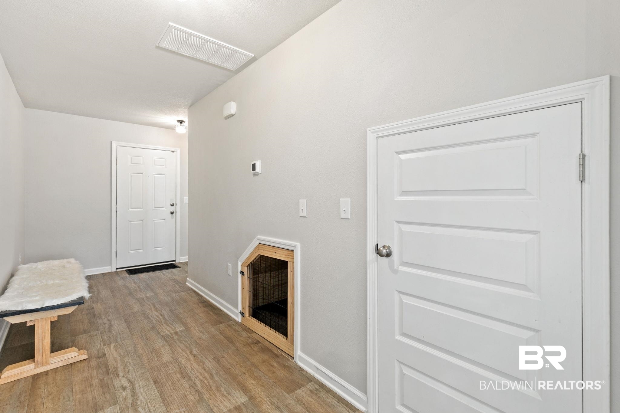 32234 Calder Court Daphne, AL 36527 - Photo 17 of 32 Corridor with baseboards and light wood-type flooring
