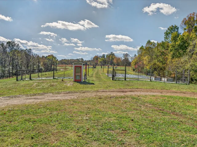 a kitchen that has a lot of cabinets in it