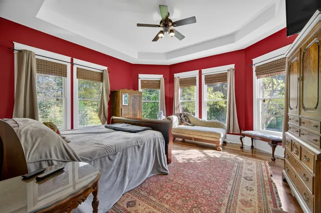 a white toilet sitting next to a shower curtain