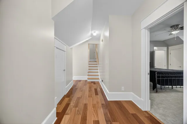 a view of a hall with living room and furniture
