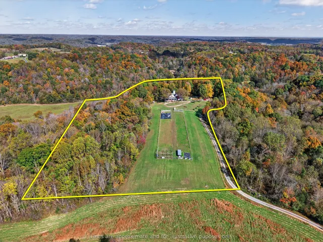 a living room with furniture or wooden floor and a flat screen tv