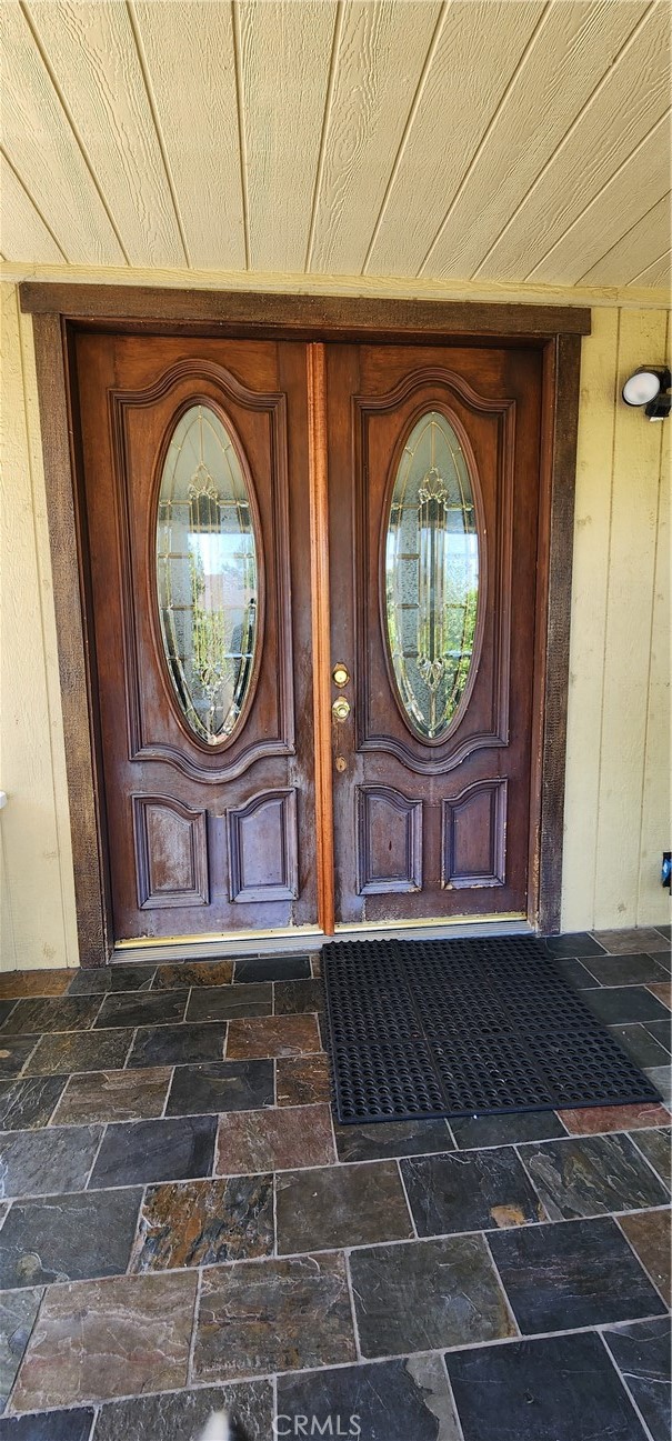 3112 1st Street Riverside, CA 92507 - Photo 18 of 61 a view of a door of a house with wooden walls