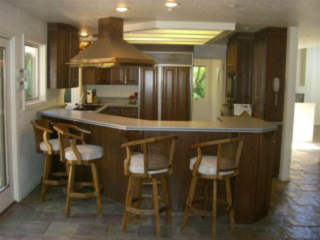 251 La Prenda Millbrae, CA 94030 - Photo 6 of 10 a kitchen with a table and chairs in it