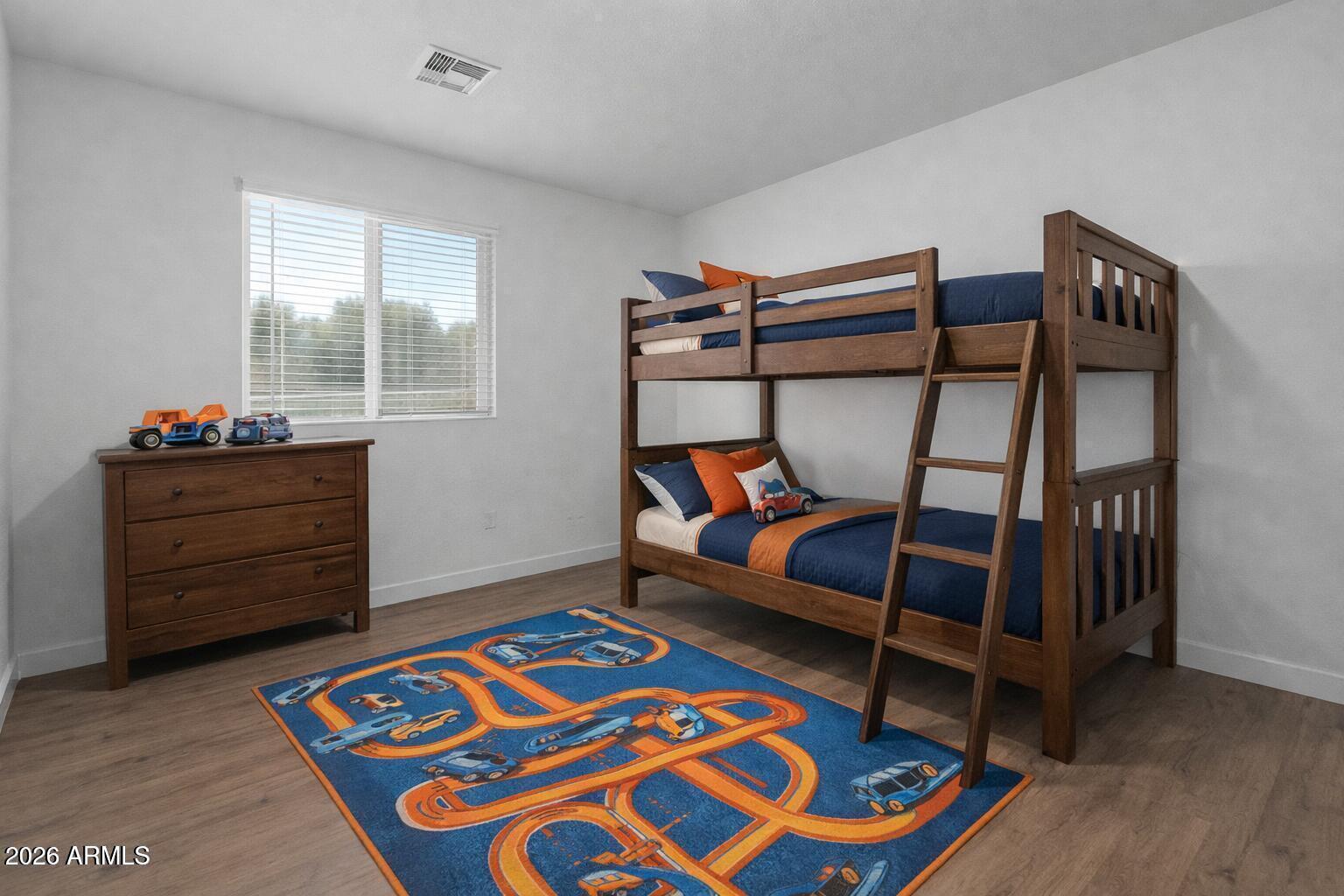 450 South Crismon Road, Unit 2 Mesa, AZ 85208 - Photo 14 of 21 a bedroom with a bunk bed and a dresser