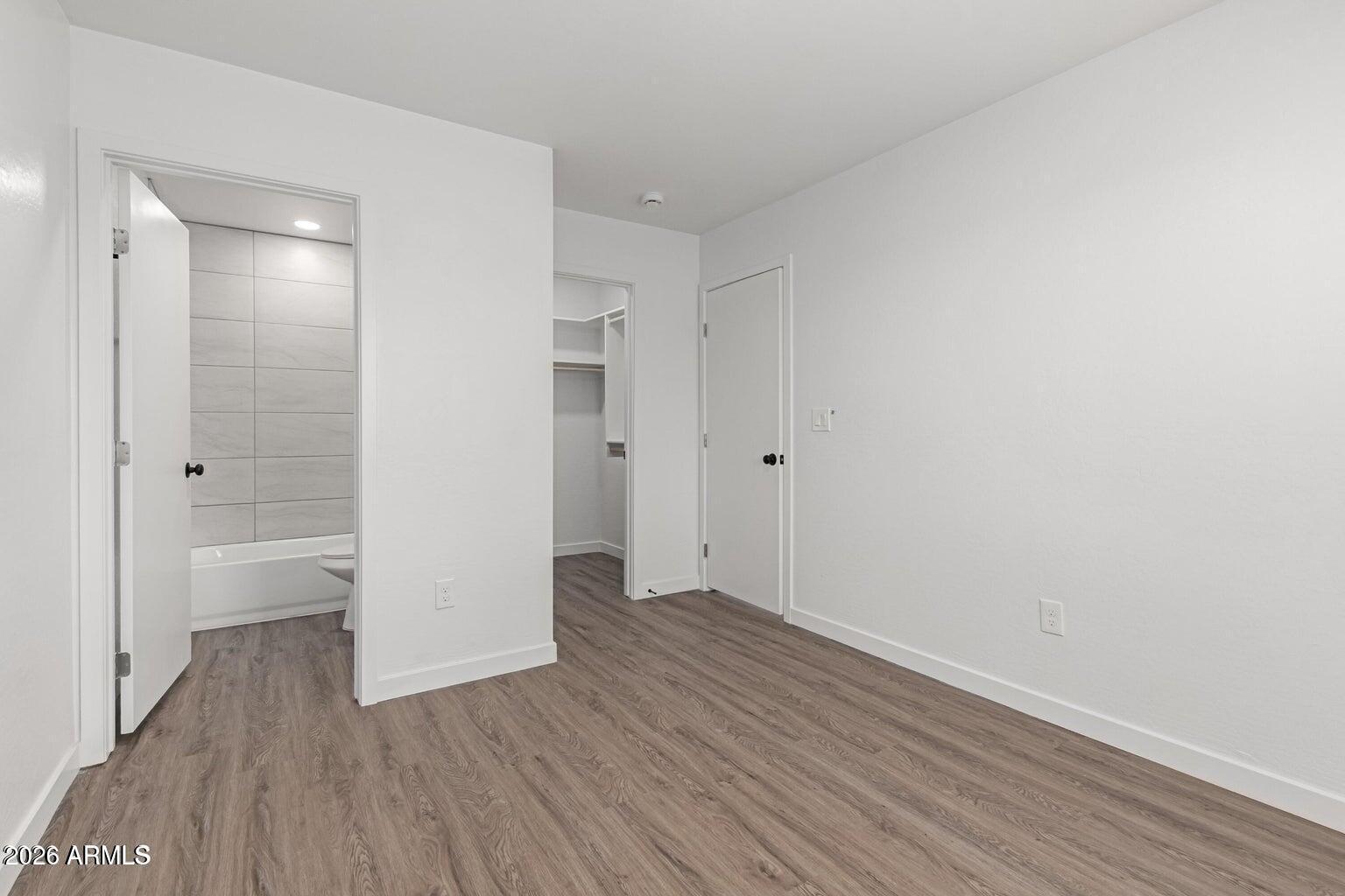 450 South Crismon Road, Unit 2 Mesa, AZ 85208 - Photo 17 of 21 wooden floor in an empty room