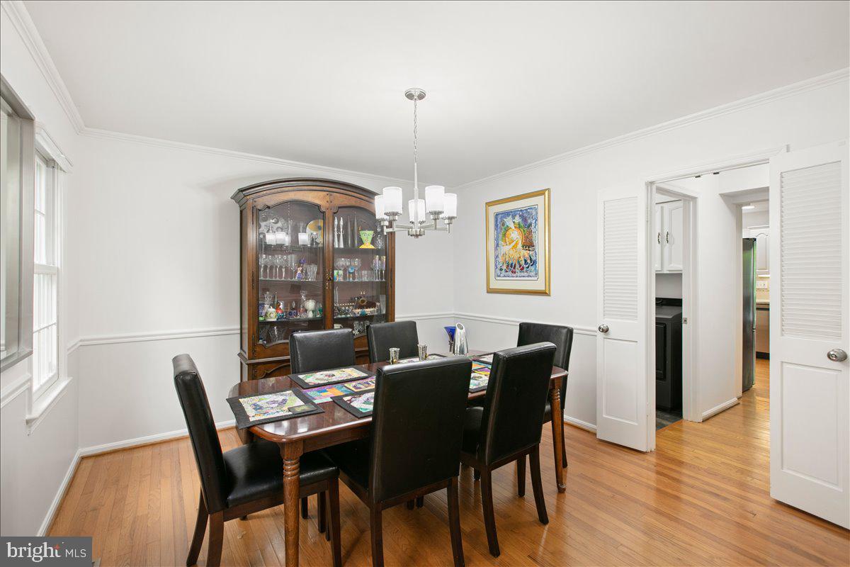 10741 Midsummer Drive Reston, VA 20191 - Photo 17 of 53 a view of a dining room with furniture window and wooden floor
