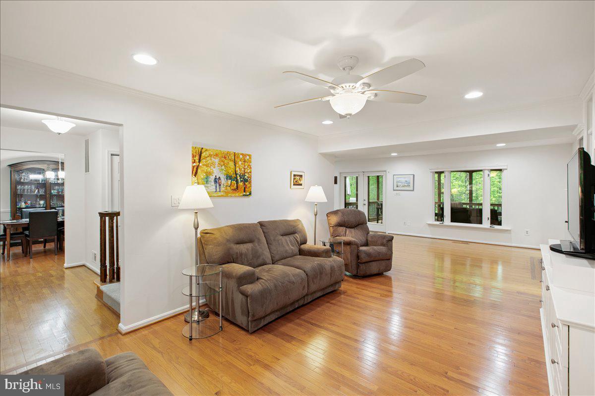 10741 Midsummer Drive Reston, VA 20191 - Photo 20 of 53 a living room with furniture and a large window