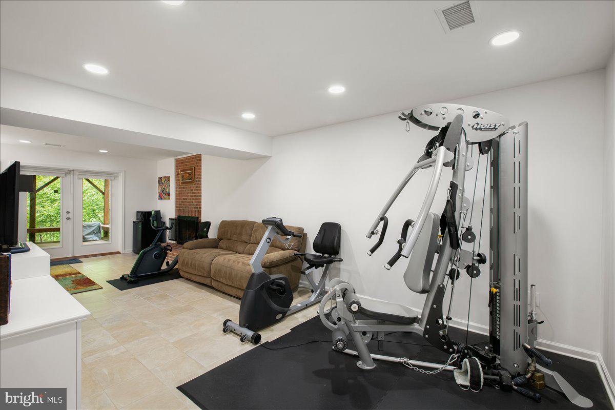10741 Midsummer Drive Reston, VA 20191 - Photo 45 of 53 a view of a room with gym equipment