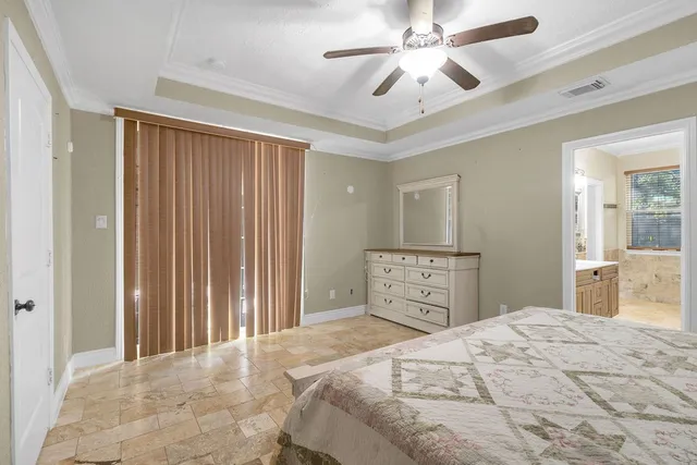 a bathroom with a sink a large mirror and a shower