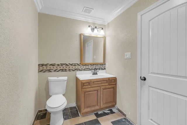 a view of a livingroom with a staircase