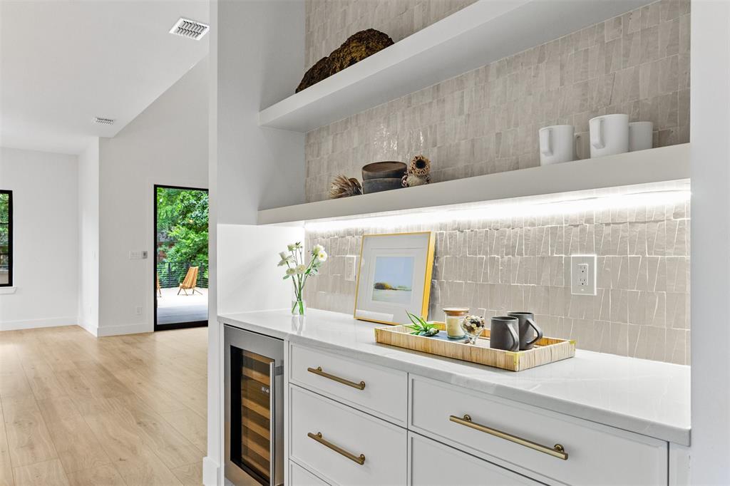 6446 Lange Circle Dallas, TX 75214 - Photo 11 of 40 a bathroom with a sink and a mirror