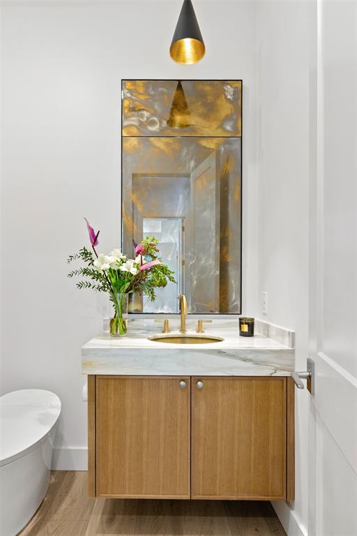 6446 Lange Circle Dallas, TX 75214 - Photo 22 of 40 a bathroom with a sink and a mirror