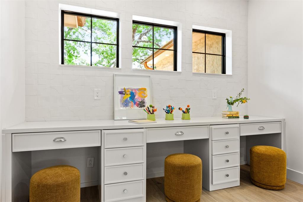 6446 Lange Circle Dallas, TX 75214 - Photo 24 of 40 a hallway with a window and cabinets