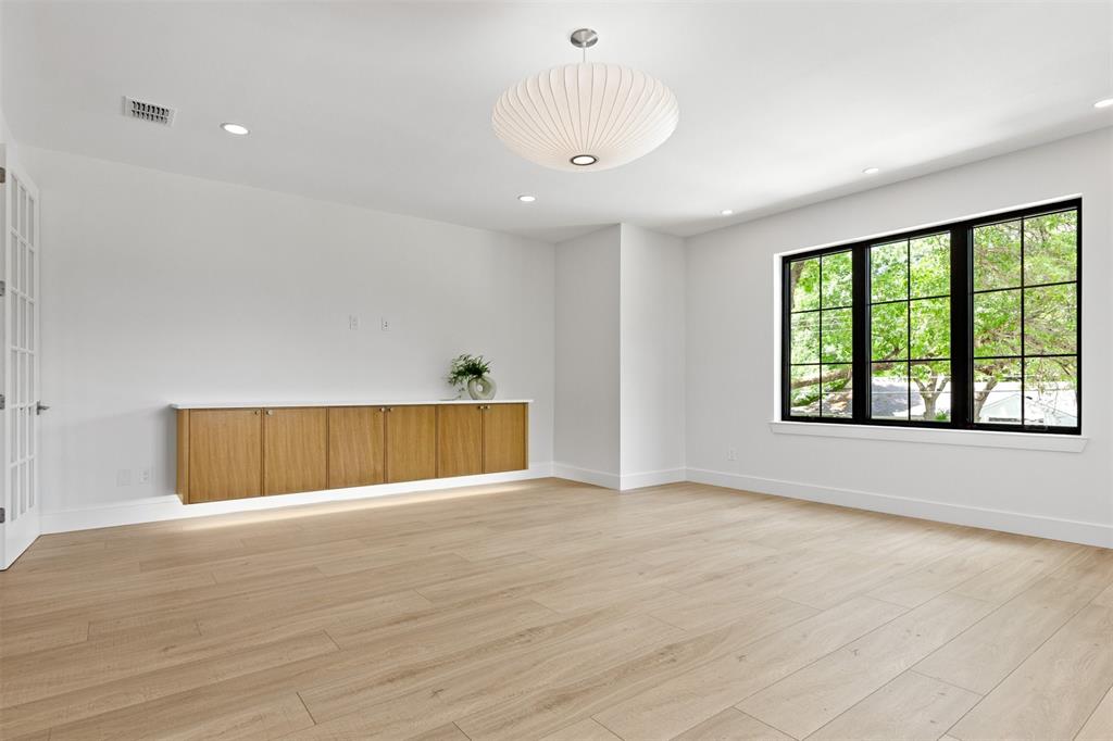 6446 Lange Circle Dallas, TX 75214 - Photo 26 of 40 wooden floor in an empty room with a window
