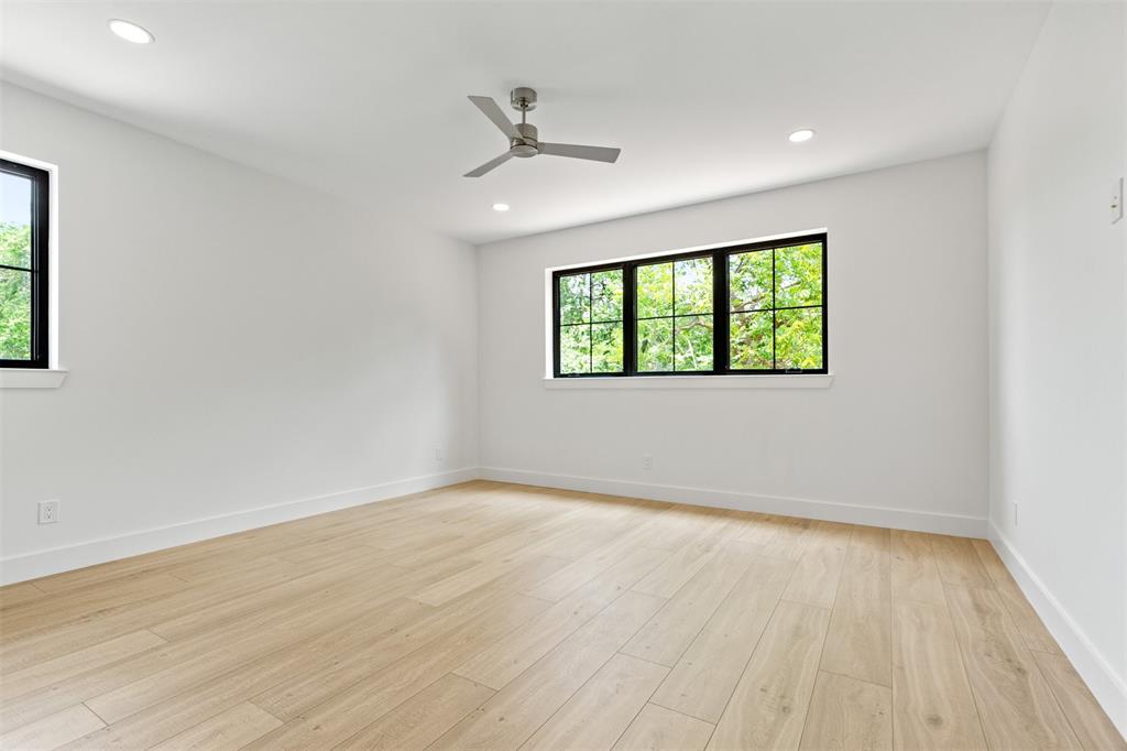 6446 Lange Circle Dallas, TX 75214 - Photo 29 of 40 wooden floor in an empty room with a window