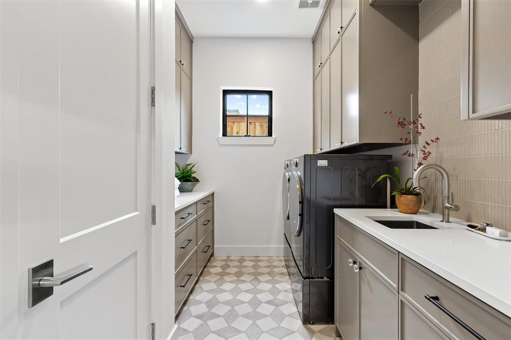 6446 Lange Circle Dallas, TX 75214 - Photo 37 of 40 a kitchen with a refrigerator and a sink