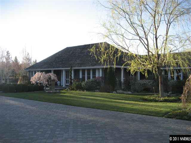 1395 View Reno Nv 89511 Reno, NV 89511 - Photo 1 of 13 a front view of a house with a yard
