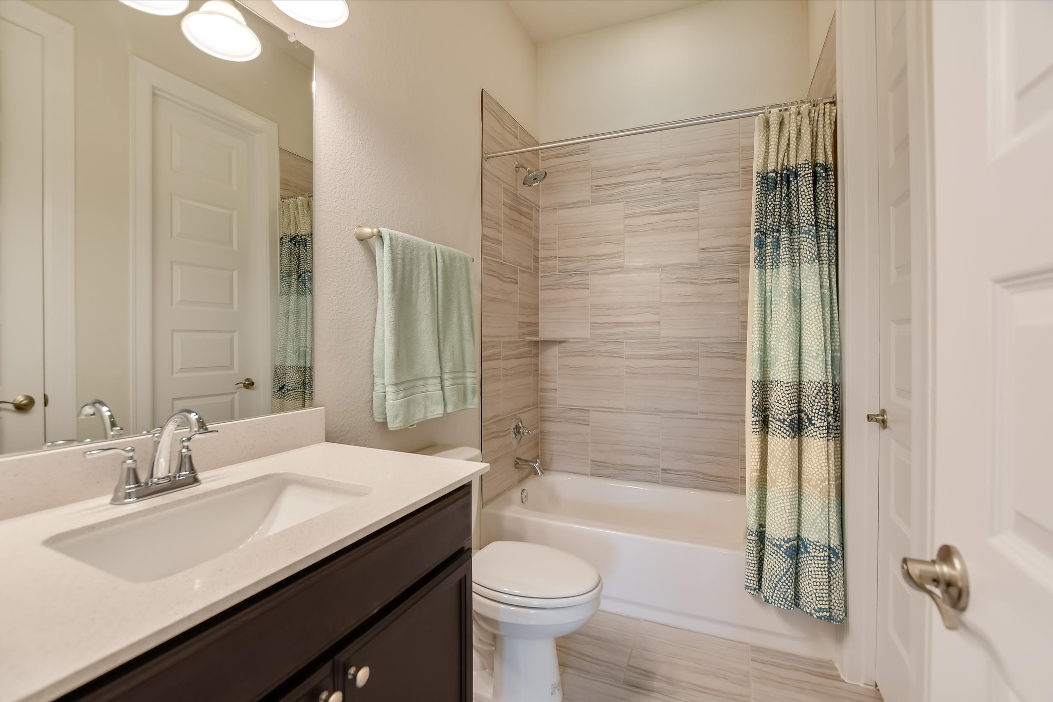 2009 Waterview Road Georgetown, TX 78628 - Photo 16 of 22 a bathroom with a sink a toilet and shower