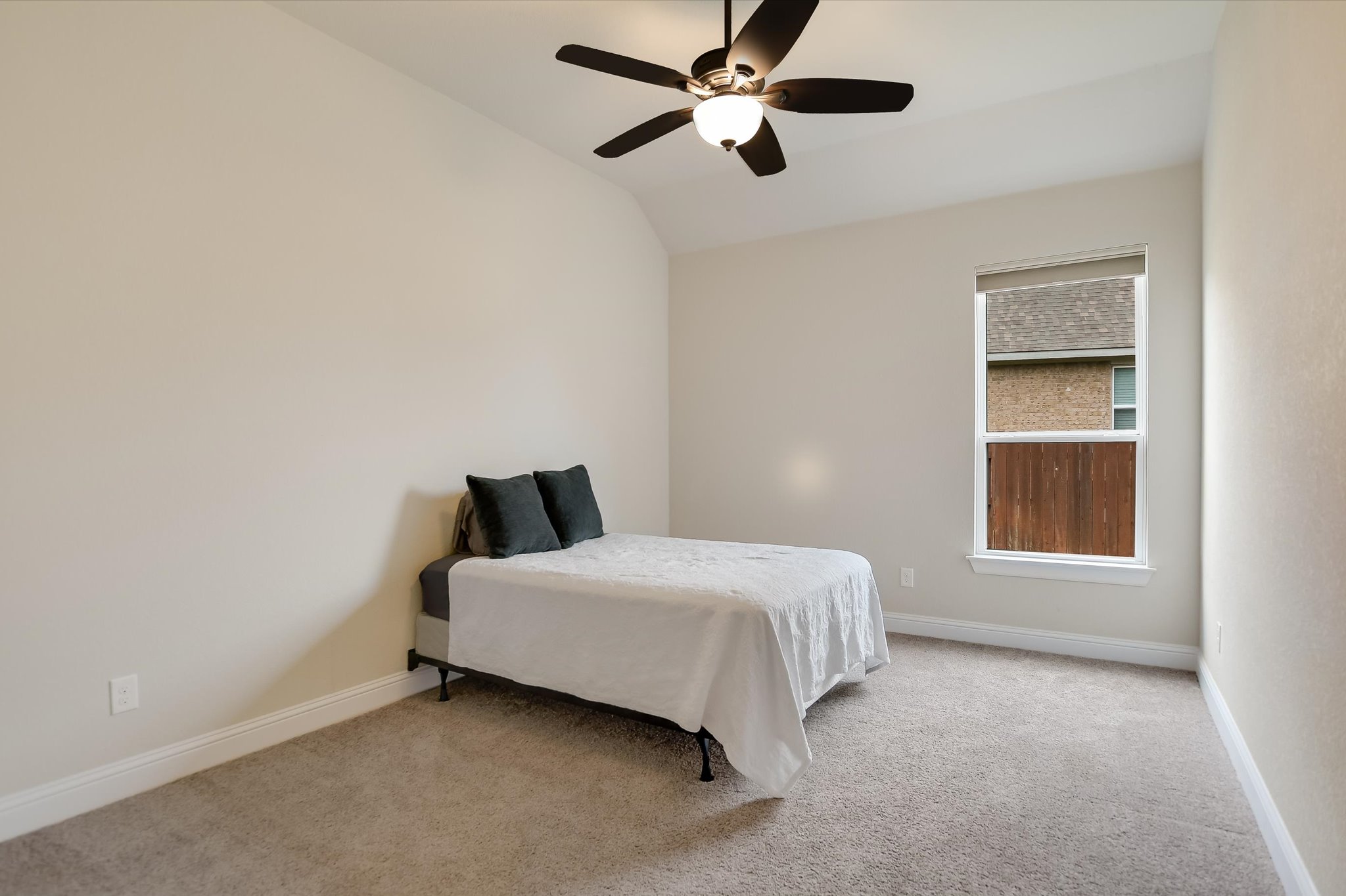 2009 Waterview Road Georgetown, TX 78628 - Photo 17 of 22 a bedroom with a bed and a window
