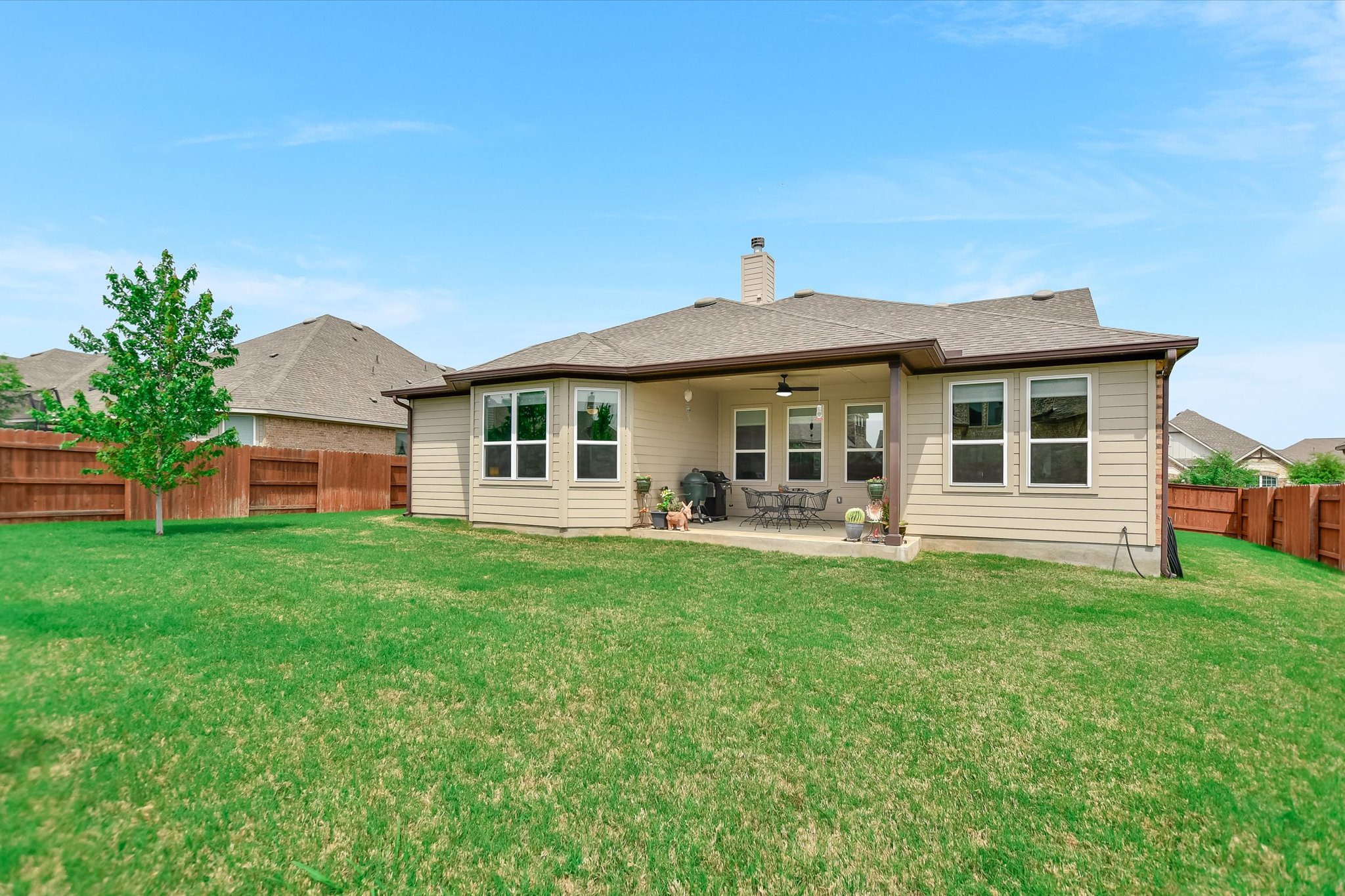 2009 Waterview Road Georgetown, TX 78628 - Photo 20 of 22 a front view of a house with a garden