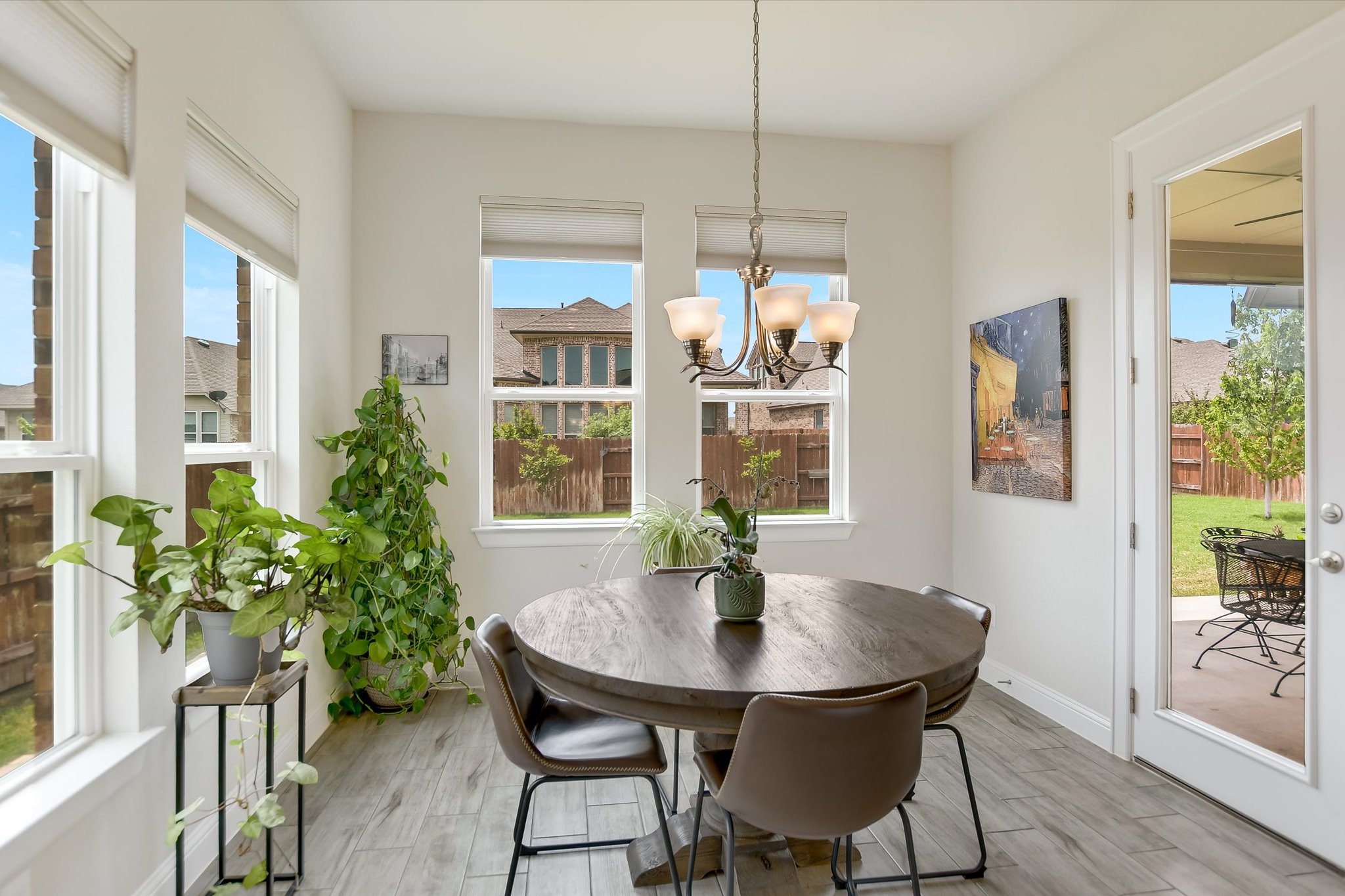 2009 Waterview Road Georgetown, TX 78628 - Photo 10 of 22 a view of a dining room with furniture window and wooden floor