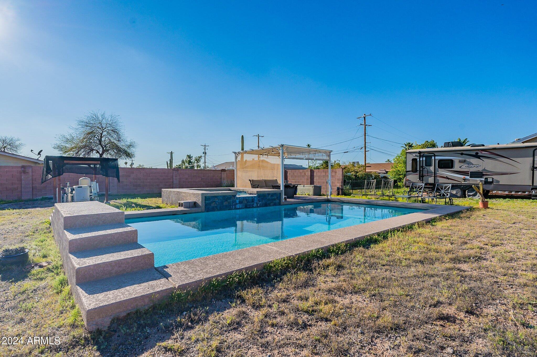 1444 South Cactus Road Apache Junction, AZ 85119 - Photo 34 of 39 Daytime Pool and Spa