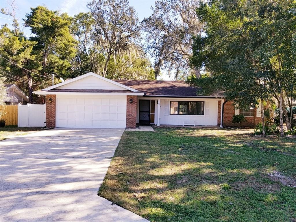67 Marta Road DeBary, FL 32713 - Photo 1 of 1 a front view of a house with a garden
