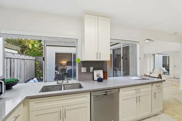 a view of a livingroom with furniture and window