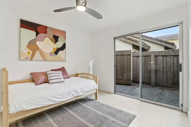 a view of storage and utility room with washer and dryer