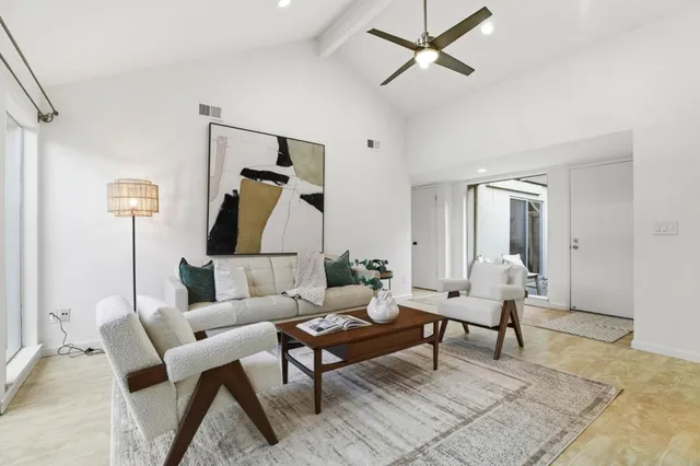 a kitchen with a sink stove top oven and refrigerator
