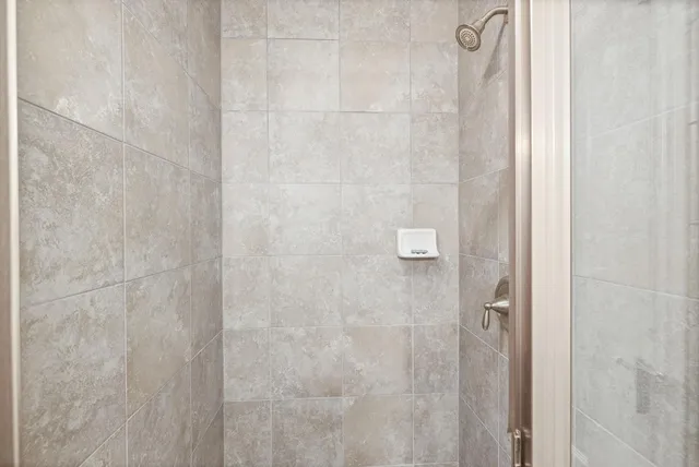 a view of two chairs in the balcony