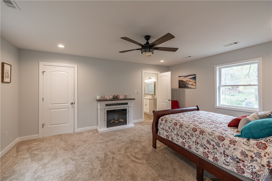 2118 Chestnut Oaks Road Powhatan, VA 23139 - Photo 25 of 41 Features carpeting, ceiling fan & electric firepl