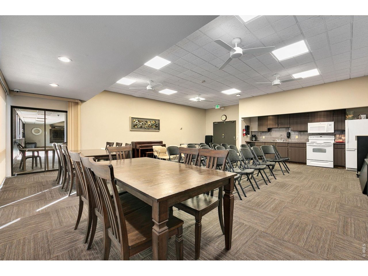 415 South Howes Street, Unit 807 Fort Collins, CO 80521 - Photo 26 of 31 Party room that connects to the pool